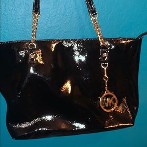 Michael Kors Black and Gold purse